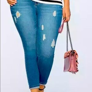 Distressed denim jeans